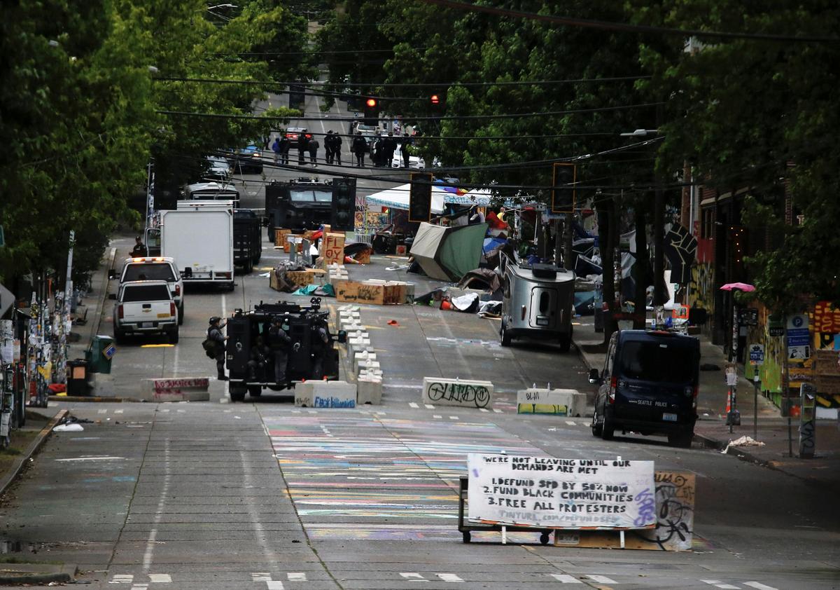 Seattle police clear protest zone after flares of violence