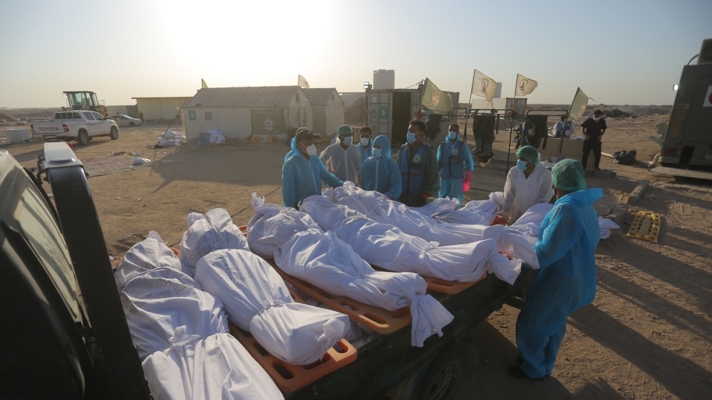 In Pictures: Lonely burials for coronavirus victims in Iraq