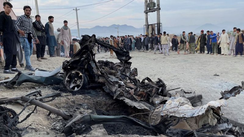 At least 68 killed in Afghan school blast, families bury victims