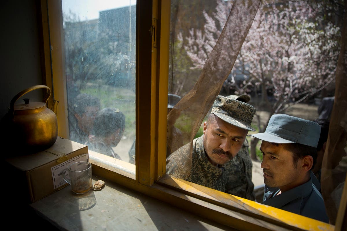 AP PHOTOS: Two decades of war and daily life in Afghanistan