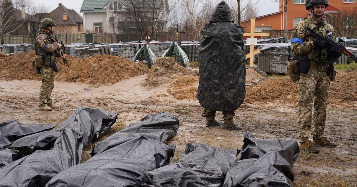 Ukrainian forensic investigators start exhuming bodies from Bucha mass grave