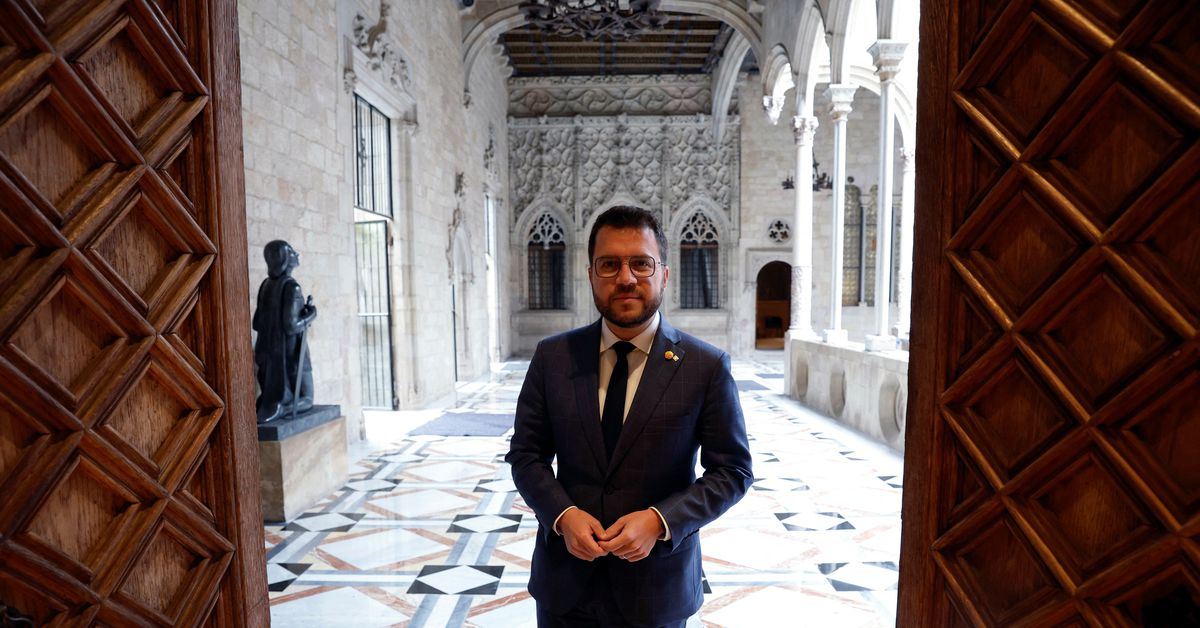 Catalan leader says to freeze parliamentary support to Spanish PM over spying row