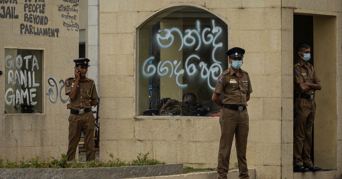 Sri Lankan security forces raid protest camp as new leaders sworn in