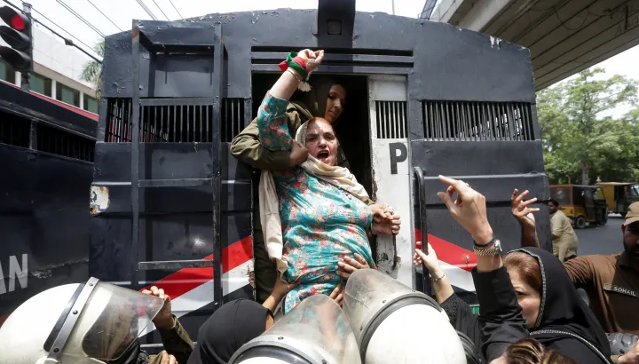 Supporters of Imran Khan gather in Pakistan to protest his two-year jail sentence.